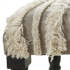 Panca da camera da letto imbottita color crema con gambe in legno nero