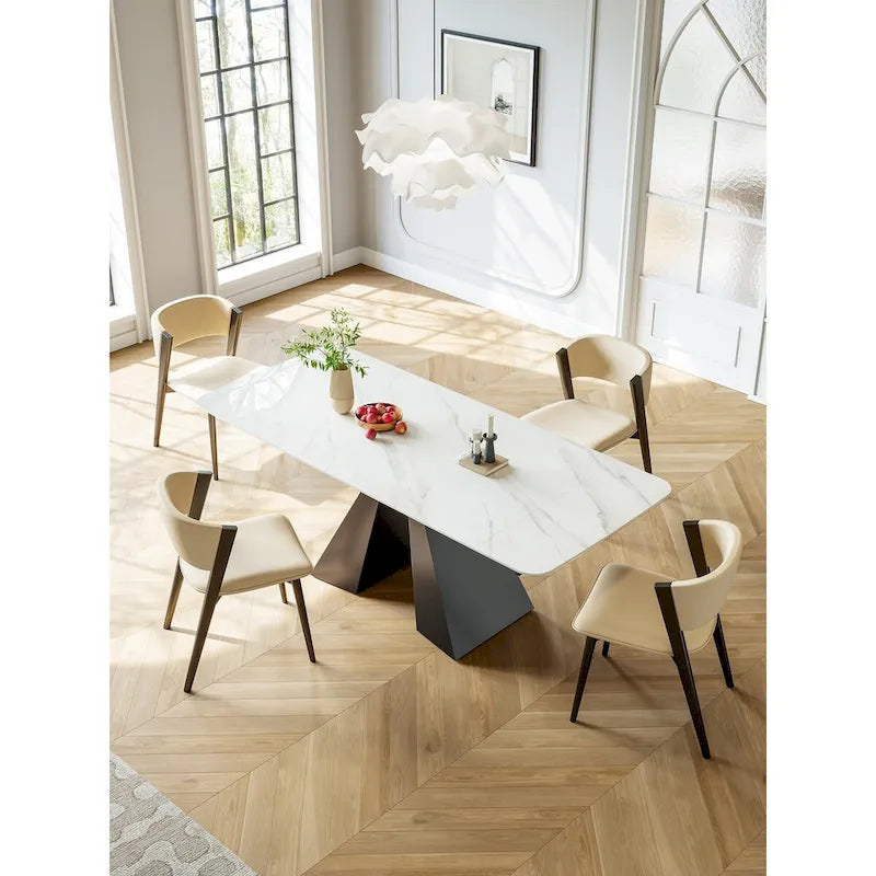 Tavolo da pranzo allungabile rettangolare con piano in pietra e base in metallo