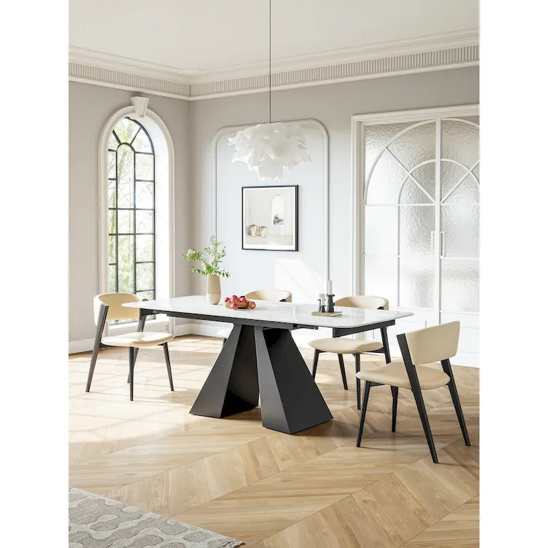 Tavolo da pranzo allungabile rettangolare con piano in pietra e base in metallo