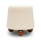 Sgabello imbottito Bouclé con gambe in legno massello