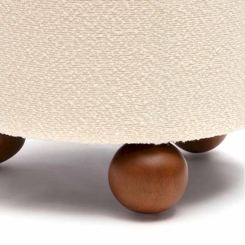Sgabello imbottito Bouclé con gambe in legno massello